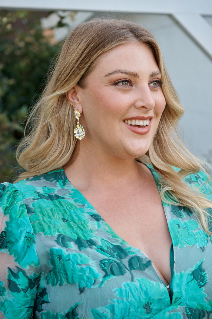 Sabine Drop Teardrop Earrings in Textured Gold campaign on model side