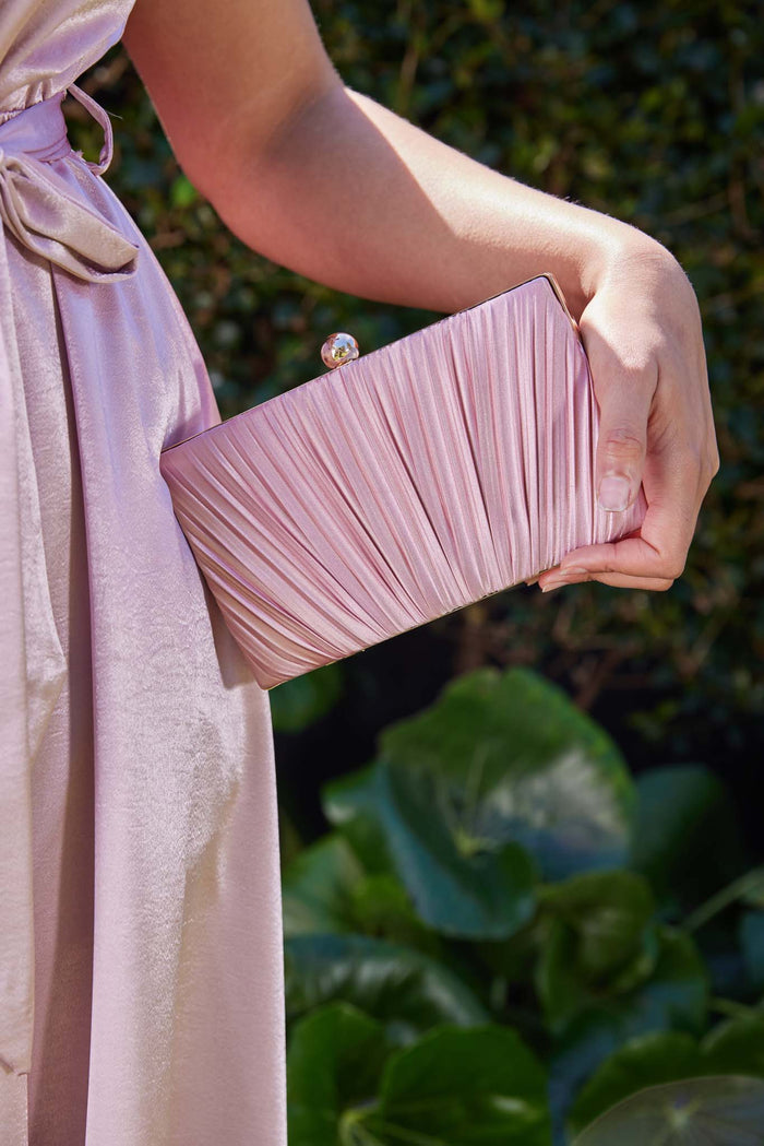 Blush pink Amina clutch styled