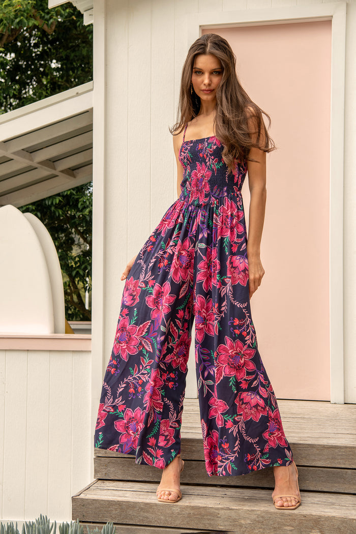 Sumire Jumpsuit in Navy with Pink Floral campaign full length