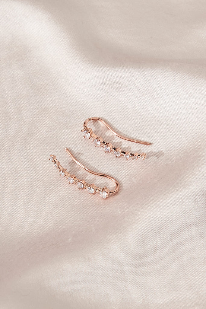 August + Delilah Starry Eyed Earrings In Rose Gold