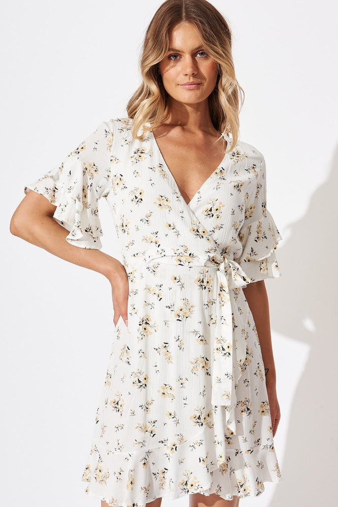 Keeyen Wrap Dress In White With Yellow Floral
