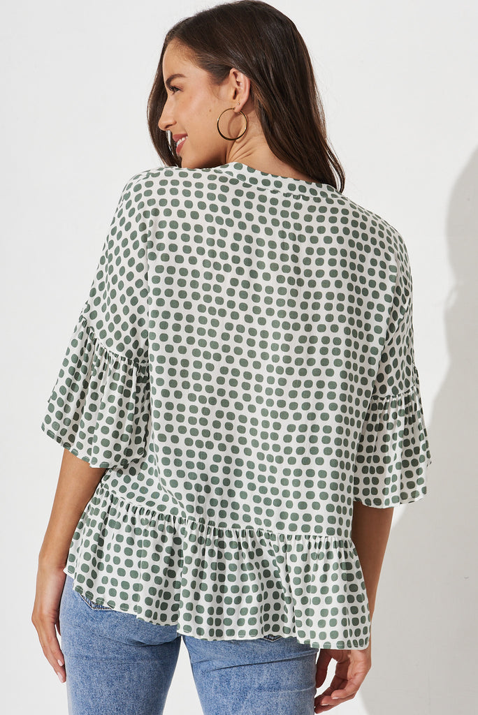 Relia Top In White With Green Polka Dot - back