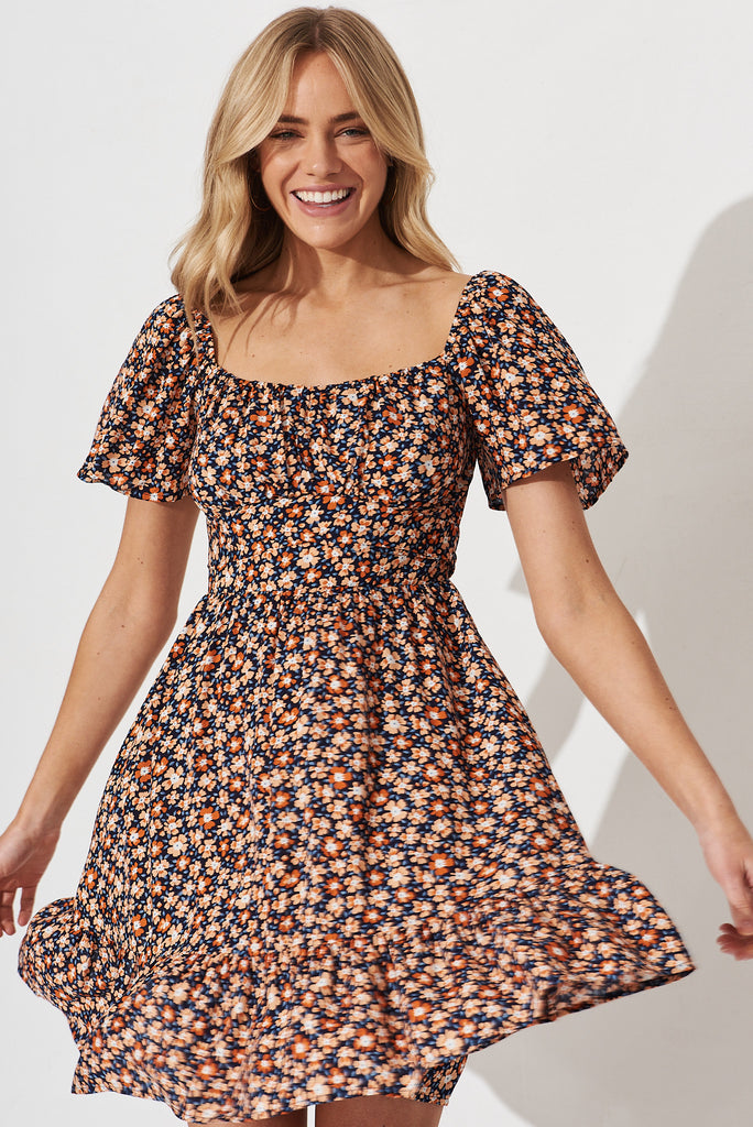 Caudalie Dress In Navy With Orange Ditsy Floral - front