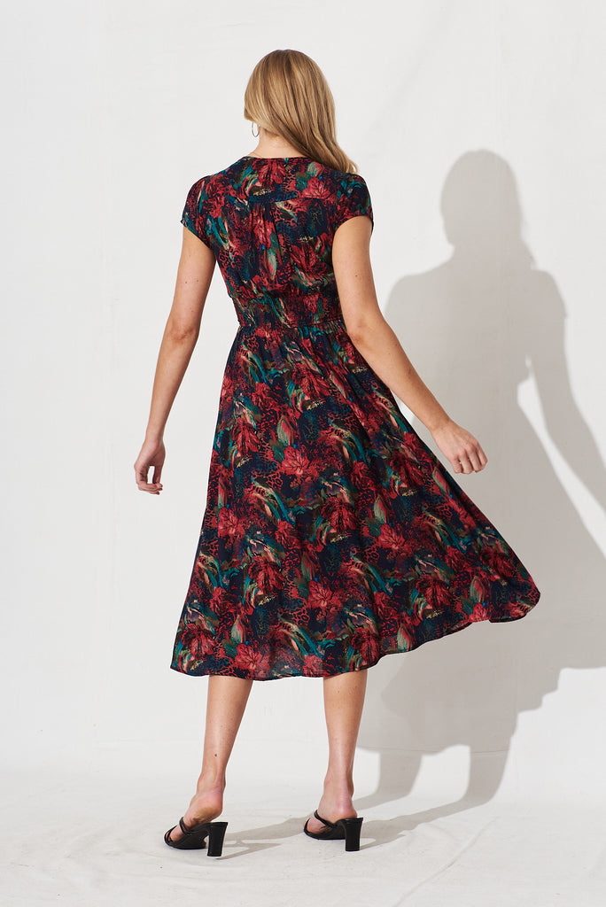 Fernadine Midi Dress In Green And Red Tropical Floral - back
