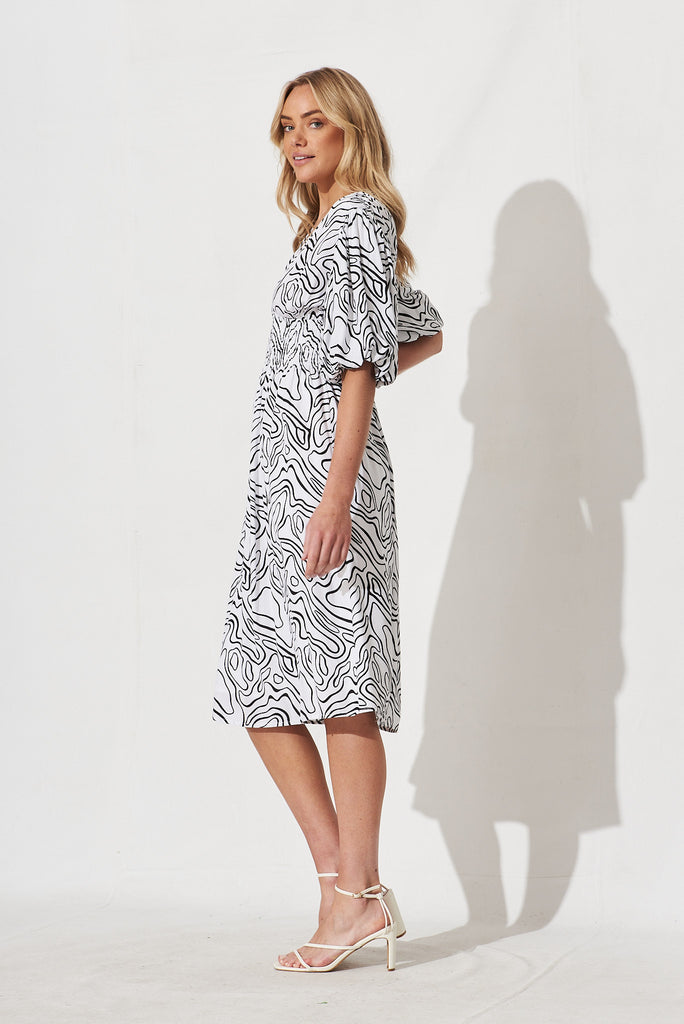 Jecci Midi Dress In White With Black Abstract Print - side