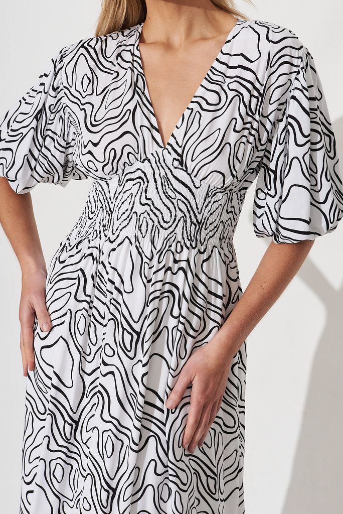 Jecci Midi Dress In White With Black Abstract Print - detail
