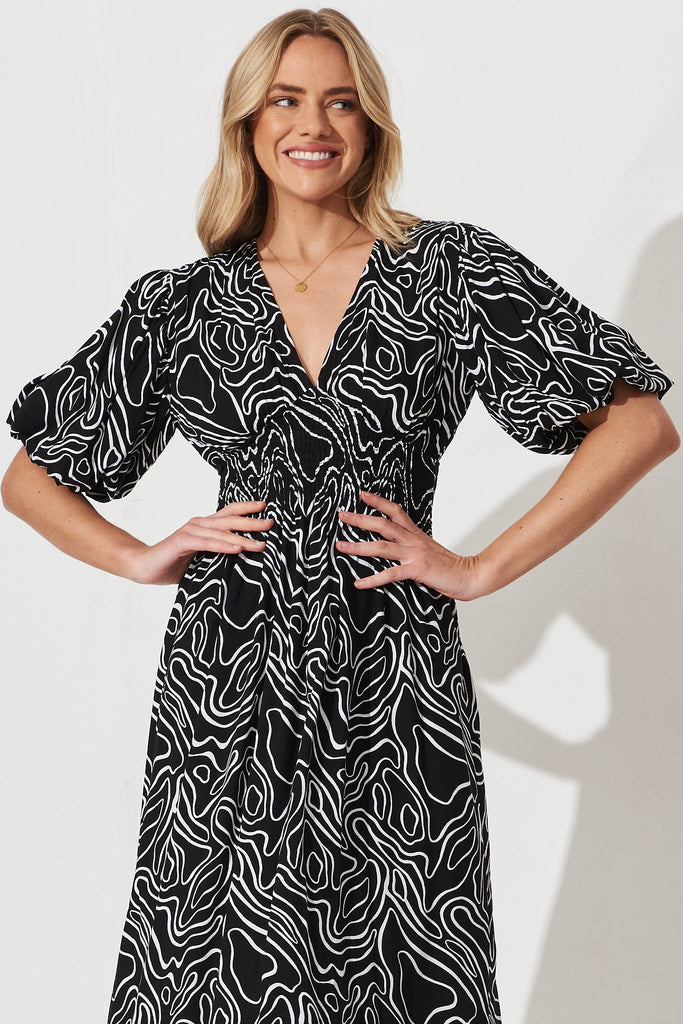 Jecci Midi Dress In Black With White Abstract Print - front