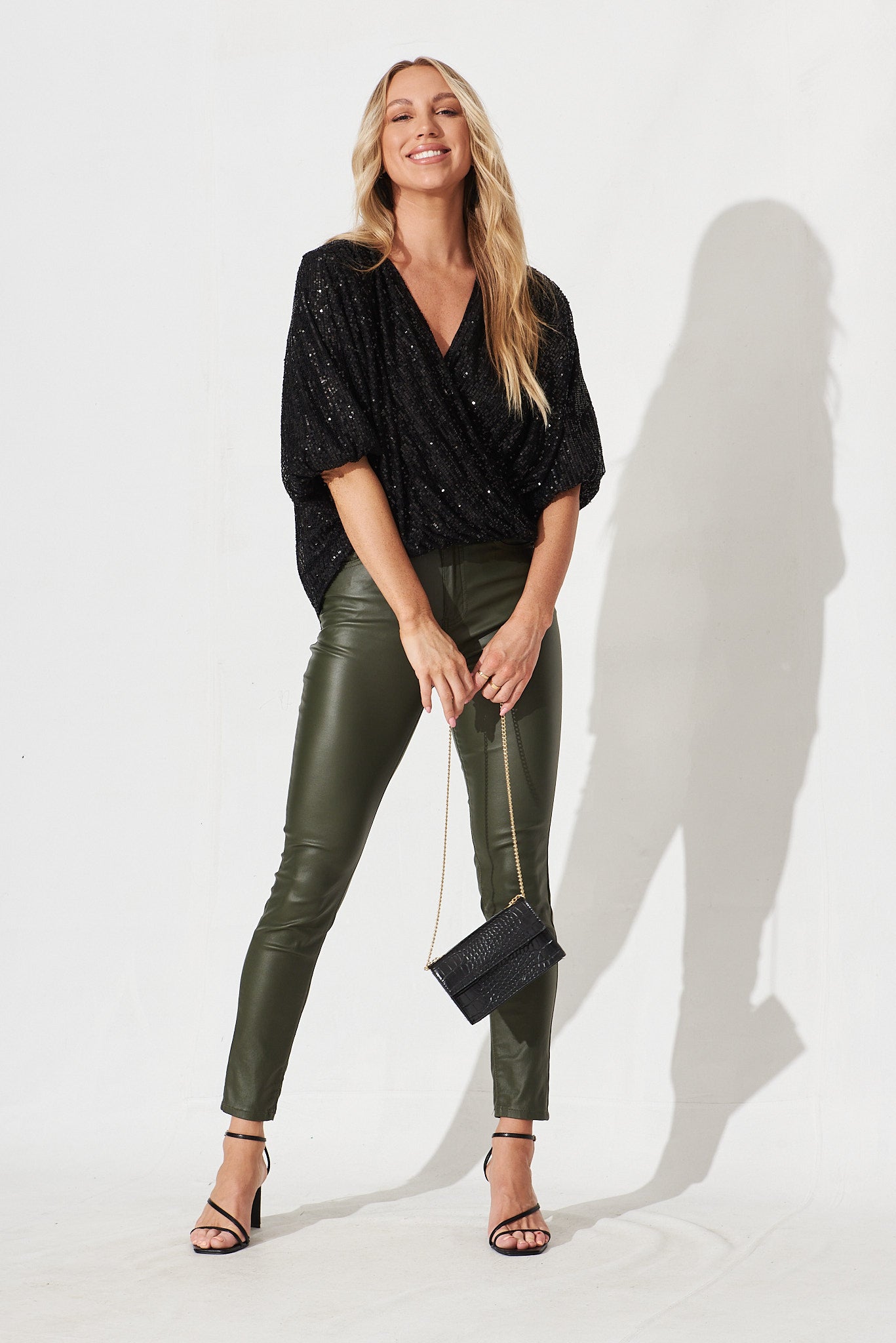 Celebration Sequin Mock Wrap Top In Black - full length